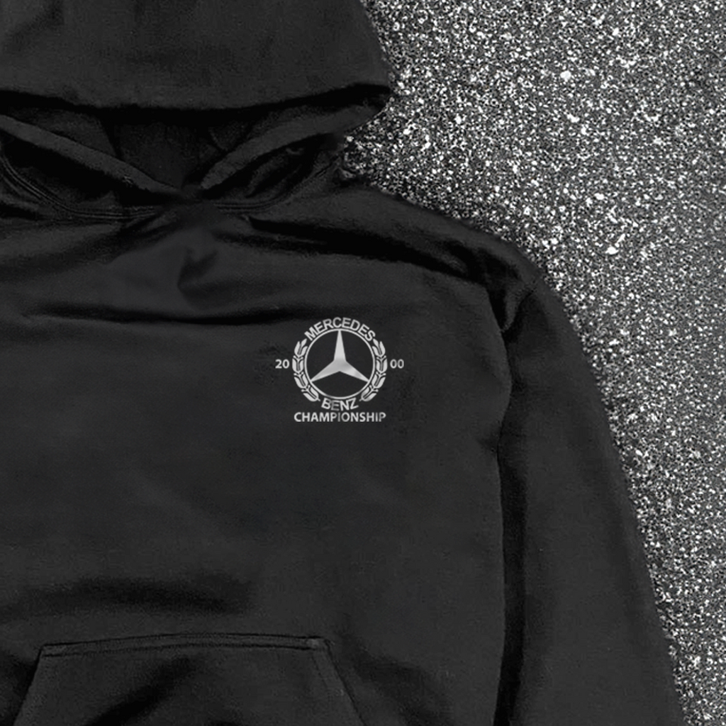 Black hooded hoodie with white Mercedes-Benz Championship chest logo and front kangaroo pocket