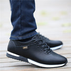 Men's low-top leather trainers with contrasting side stripe