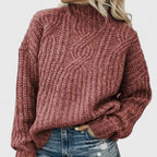 Women's cable knit sweater with mock neck and long sleeves