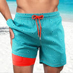Men's slim fit swim shorts with printed pattern and interior lining, drawstring waist
