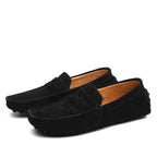 Men's suede loafers with moc toe stitching and flat soles