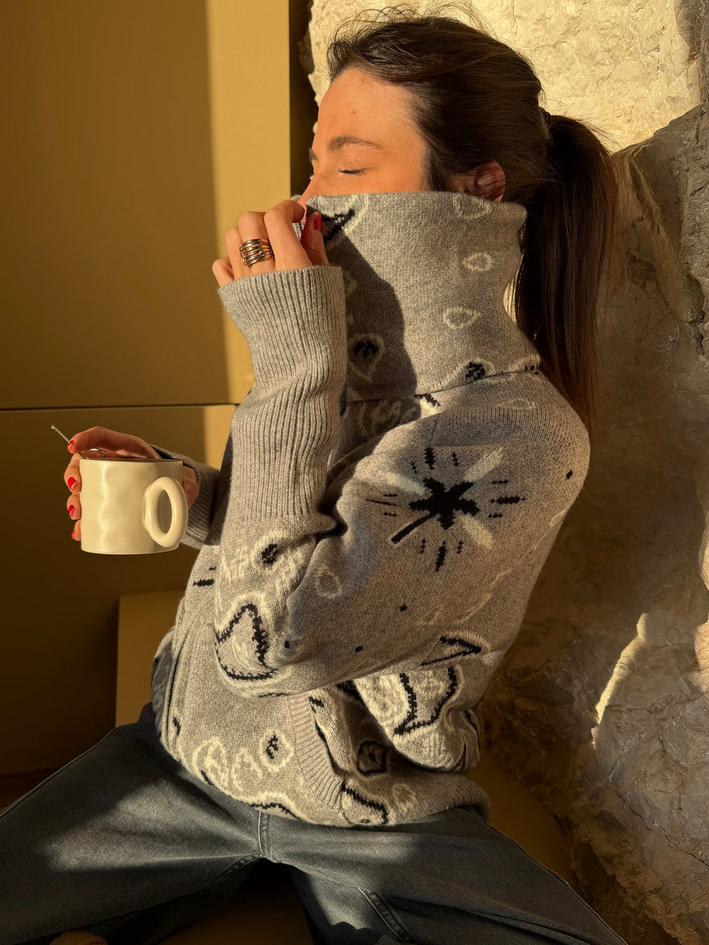 Women's paisley knit cardigan with zip front and high collar