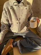 Women's paisley knit cardigan with zip front and high collar