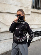 Women's paisley knit cardigan with zip front and high collar