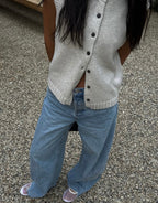 Women's knitted sleeveless cardigan vest with button front