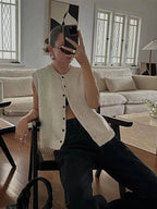 Women's knitted sleeveless cardigan vest with button front