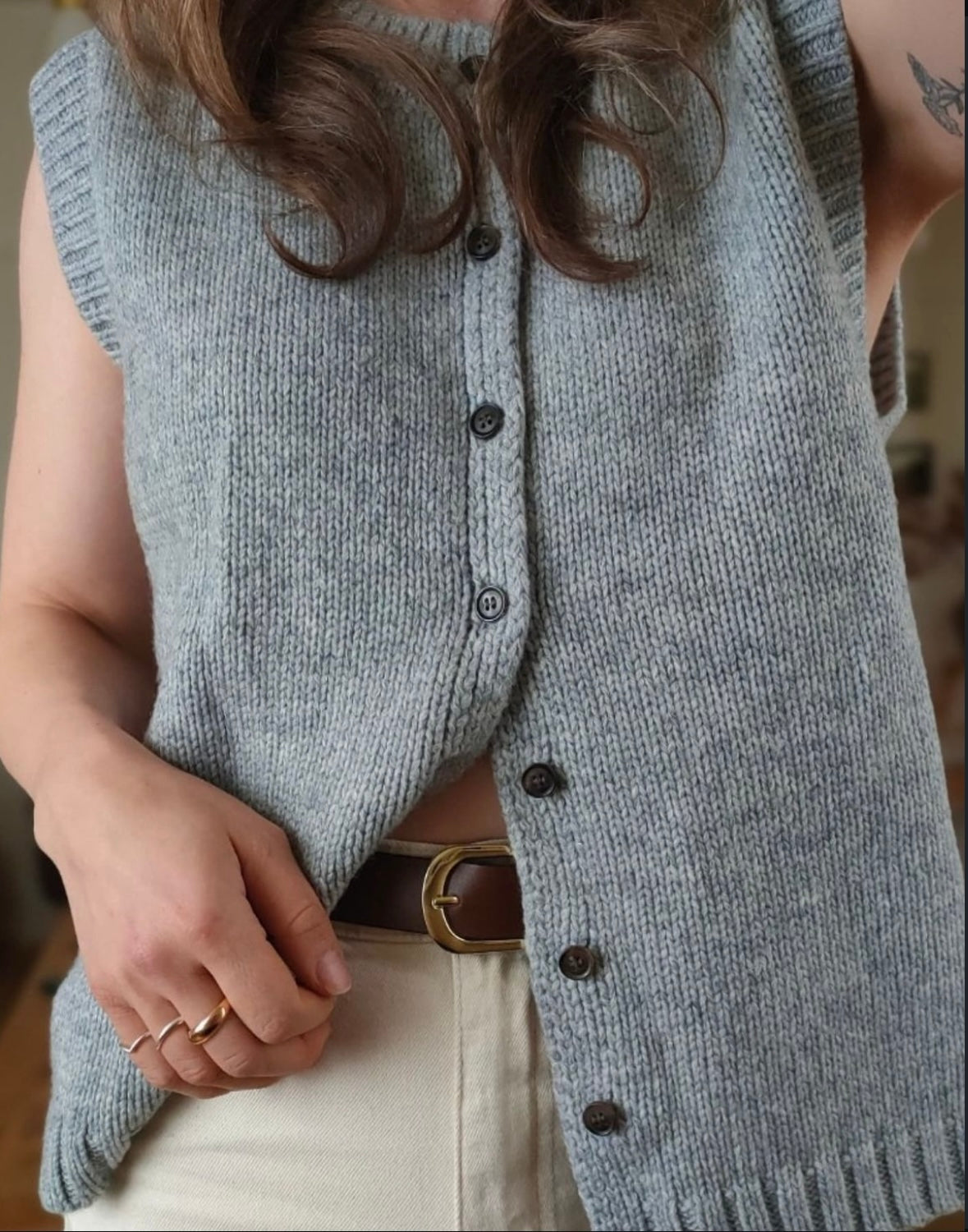 Women's knitted sleeveless cardigan vest with button front