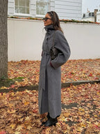 Women's grey belted long coat with stand collar and side pockets