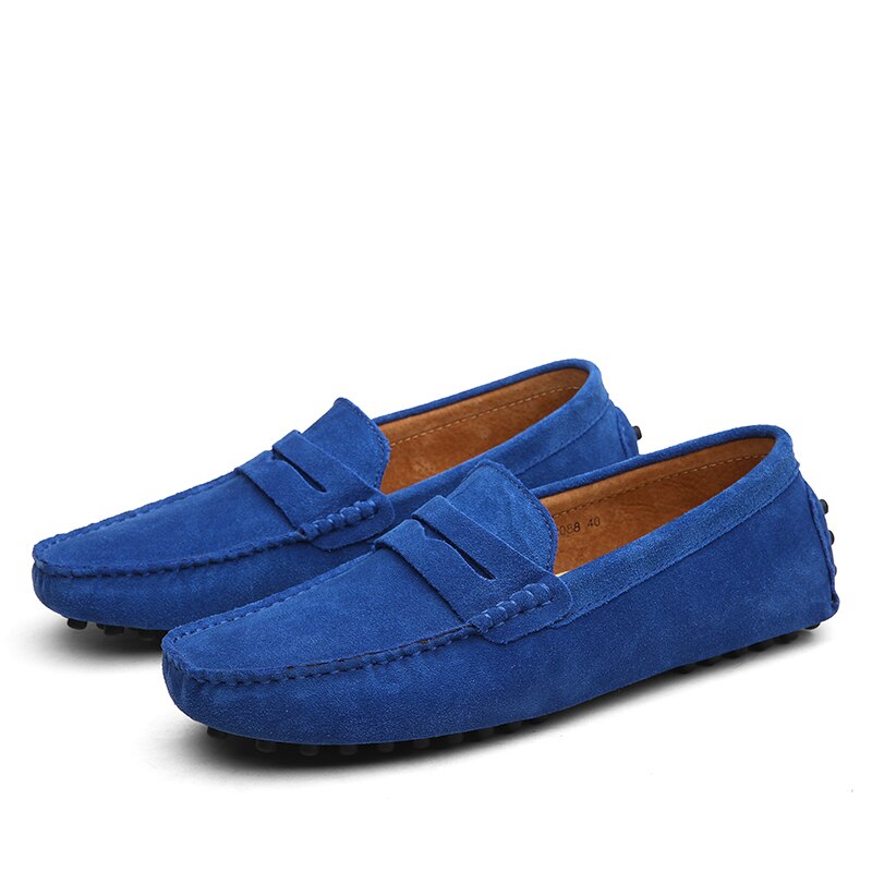 Men's slip-on penny loafers with moc toe stitching and strap detail