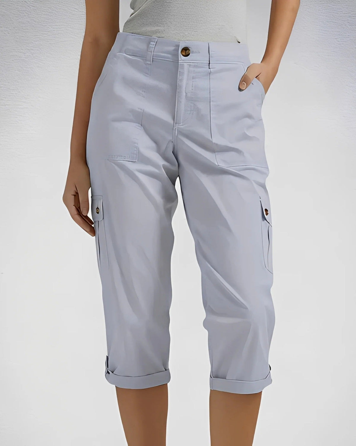 Women's high-waisted cropped cargo trousers with straight legs and multiple flap pockets