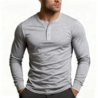 Men's slim fit long sleeve Henley T-shirt with round neckline and button placket