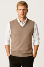 Men's V-neck sweater vest with ribbed trim over a collared shirt