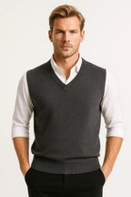 Men's V-neck sweater vest with ribbed trim over a collared shirt