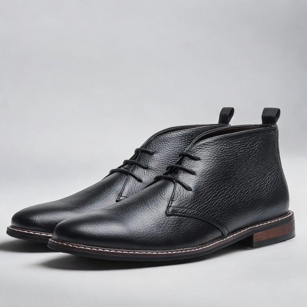 Men's chukka boots with lace-up front, rounded toe and low heel