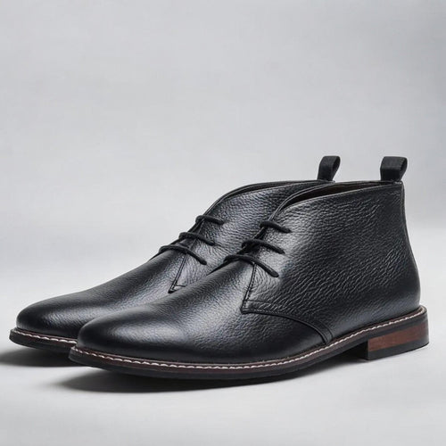 Men's chukka boots with lace-up front, rounded toe and low heel