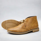 Men's chukka boots with lace-up front, rounded toe and low heel