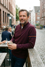 Men's quarter-zip mock neck sweater with contrast sleeve stripes