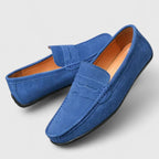 Men's blue penny loafers with moc toe stitching