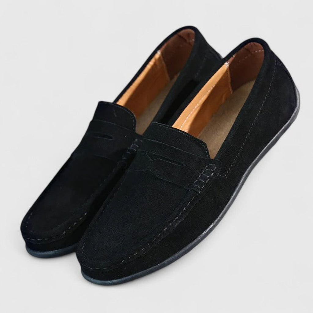 Men's blue penny loafers with moc toe stitching