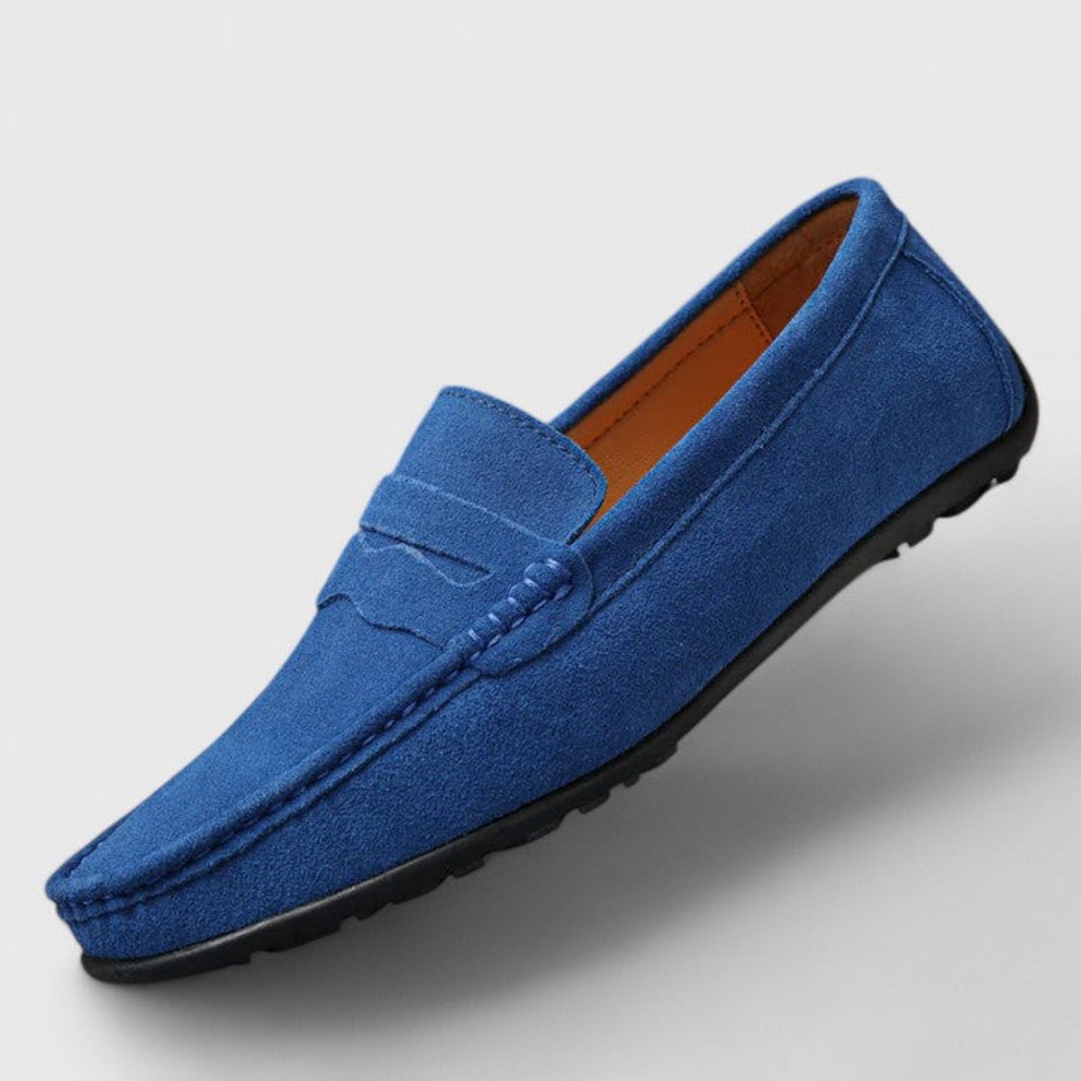 Men's blue penny loafers with moc toe stitching