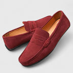 Men's blue penny loafers with moc toe stitching