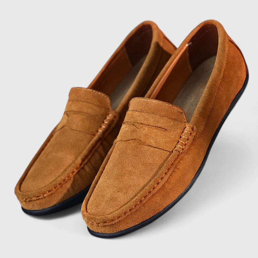 Men's blue penny loafers with moc toe stitching