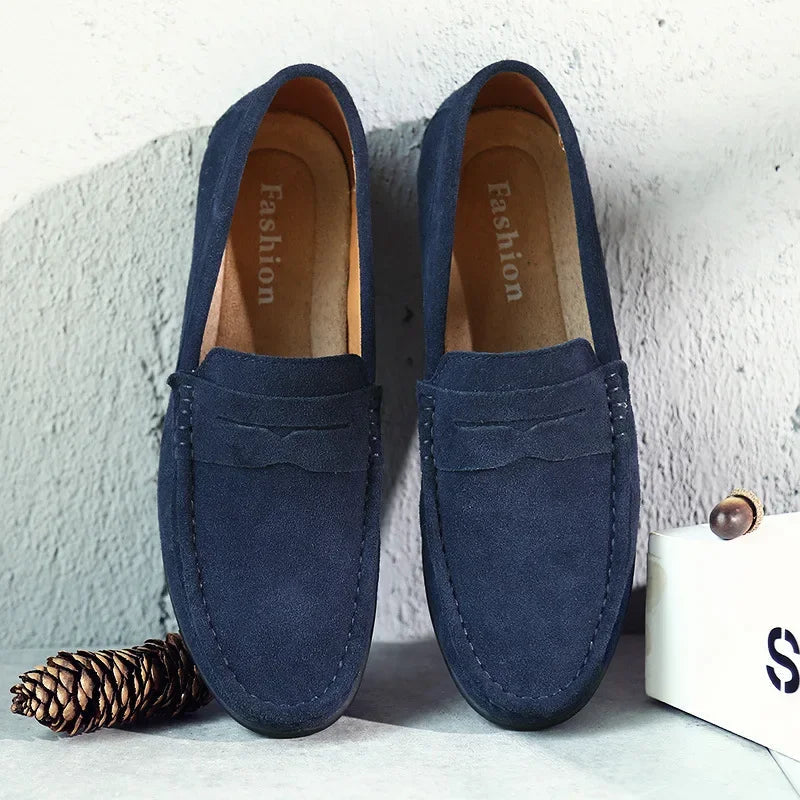 Men's penny loafers with moc toe stitching and flat soles