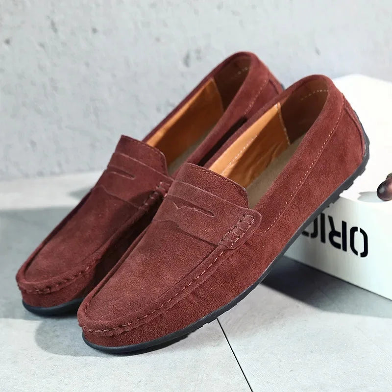 Men's penny loafers with moc toe stitching and flat soles