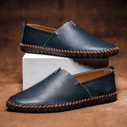Men's slip-on loafers with contrast stitching and flat sole