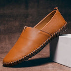 Men's slip-on loafers with contrast stitching and flat sole