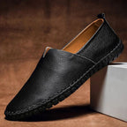 Men's slip-on loafers with contrast stitching and flat sole