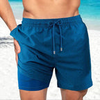 Men's slim fit swim shorts with printed pattern and interior lining, drawstring waist