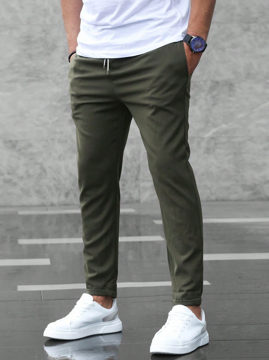 Men's slim fit jogger pants with drawstring waist and tapered cuff in grey