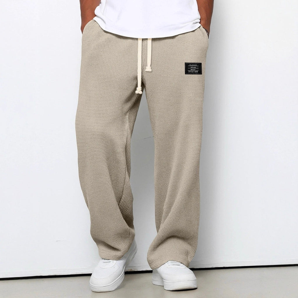 Men's relaxed-fit wide-leg trousers with drawstring waist in textured fabric