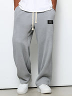 Men's relaxed-fit wide-leg trousers with drawstring waist in textured fabric