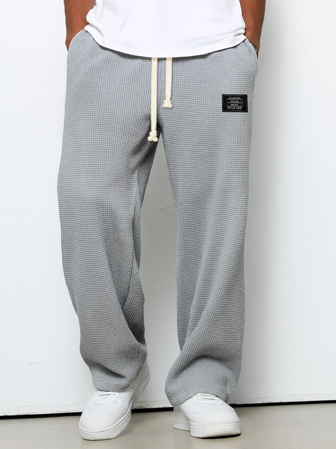 Men's relaxed-fit wide-leg trousers with drawstring waist in textured fabric
