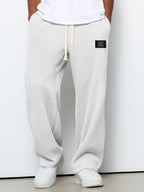 Men's relaxed-fit wide-leg trousers with drawstring waist in textured fabric