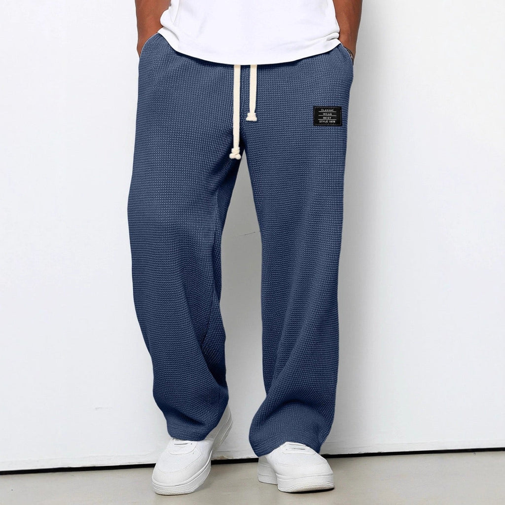 Men's relaxed-fit wide-leg trousers with drawstring waist in textured fabric