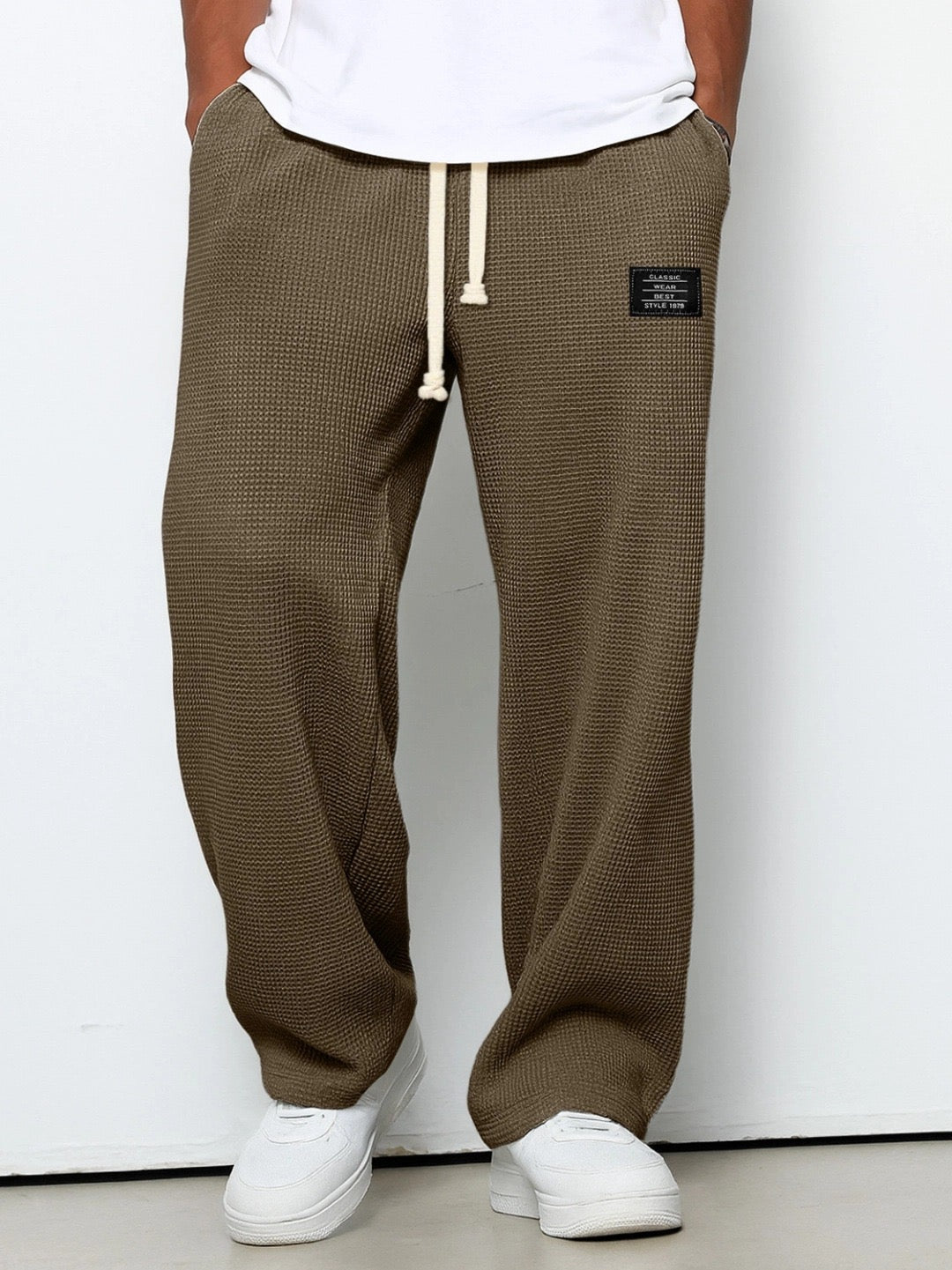 Men's relaxed-fit wide-leg trousers with drawstring waist in textured fabric