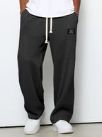 Men's relaxed-fit wide-leg trousers with drawstring waist in textured fabric