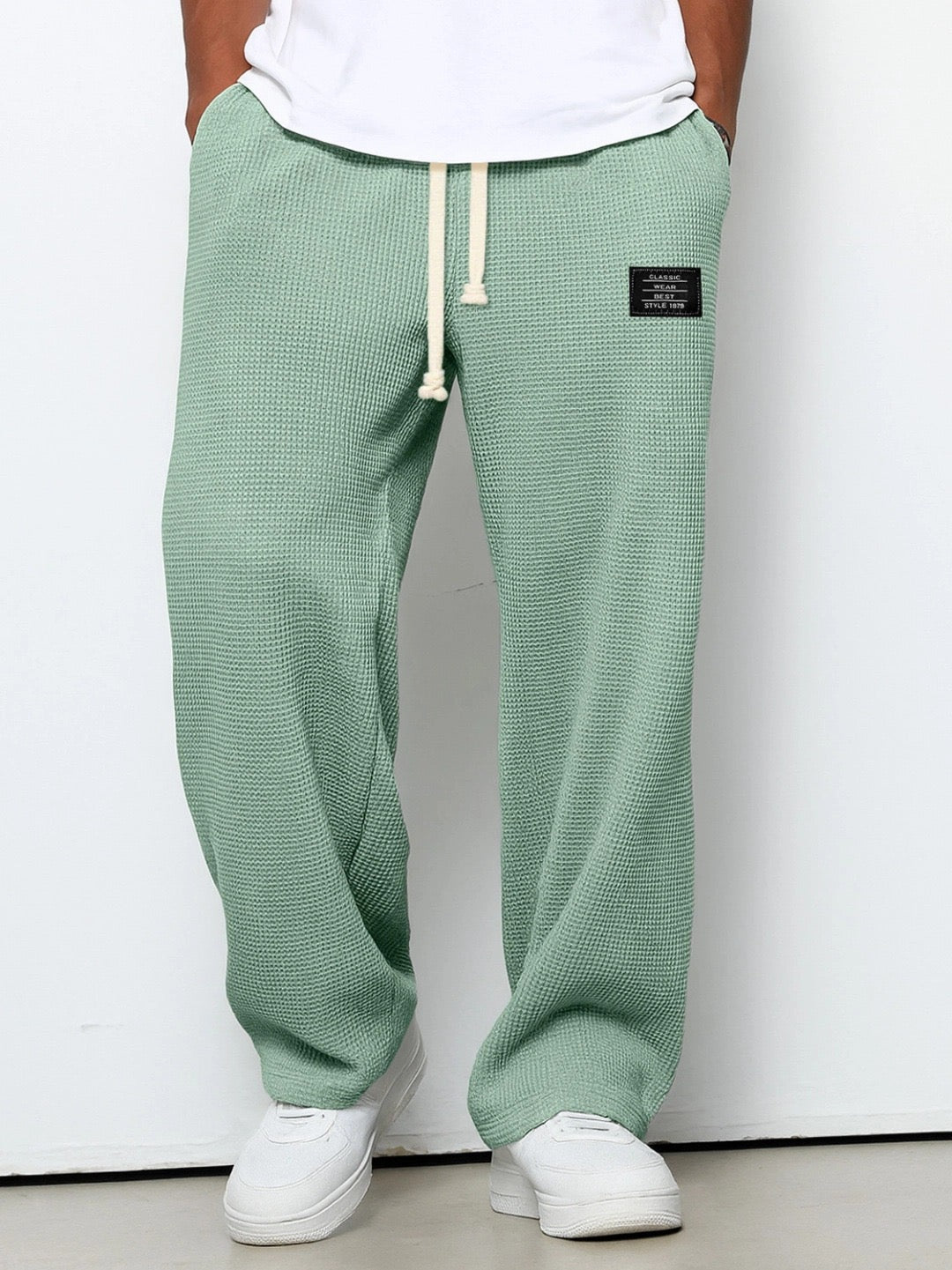 Men's relaxed-fit wide-leg trousers with drawstring waist in textured fabric