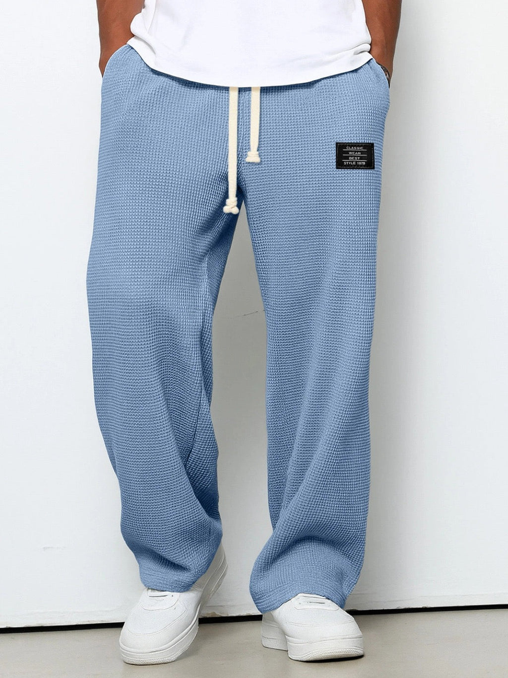 Men's relaxed-fit wide-leg trousers with drawstring waist in textured fabric