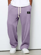 Men's relaxed-fit wide-leg trousers with drawstring waist in textured fabric