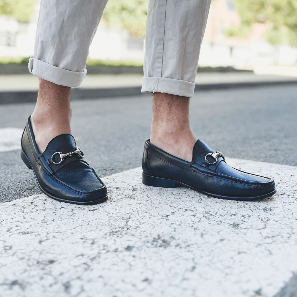 Men's black leather moccasin loafers with silver metal bit