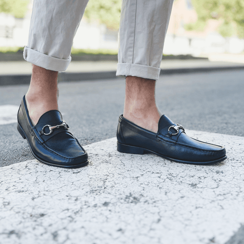 Men's black leather moccasin loafers with silver metal bit