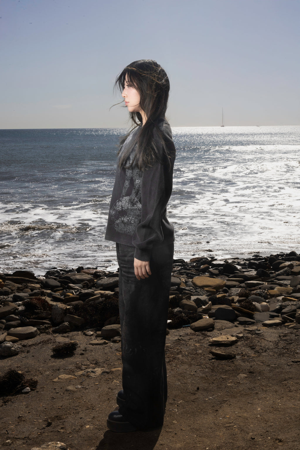 Dark graphic sweatshirt with contrasting front figure design