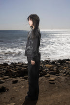 Dark graphic sweatshirt with contrasting front figure design
