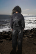 Dark graphic sweatshirt with contrasting front figure design