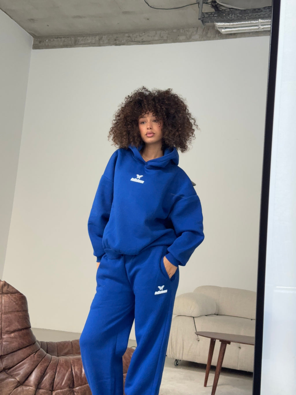 Blue long-sleeve logo hoodie with hood and kangaroo pocket