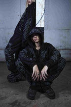 Black graphic zip hoodie with drawstring hood and long sleeves